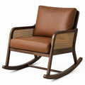Sedia a dondolo in legno e rattan con seduta in similpelle marrone